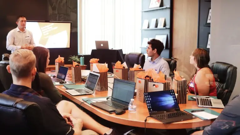 Team meeting with presentation in modern boardroom