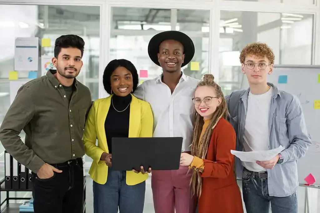 Diverse team collaborating in modern office space.